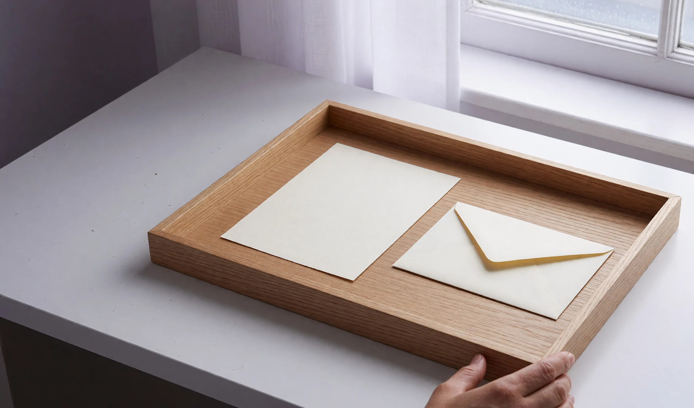 Empty verification tray with a blank card and closed envelope Empty verification tray with a blank card and closed envelope