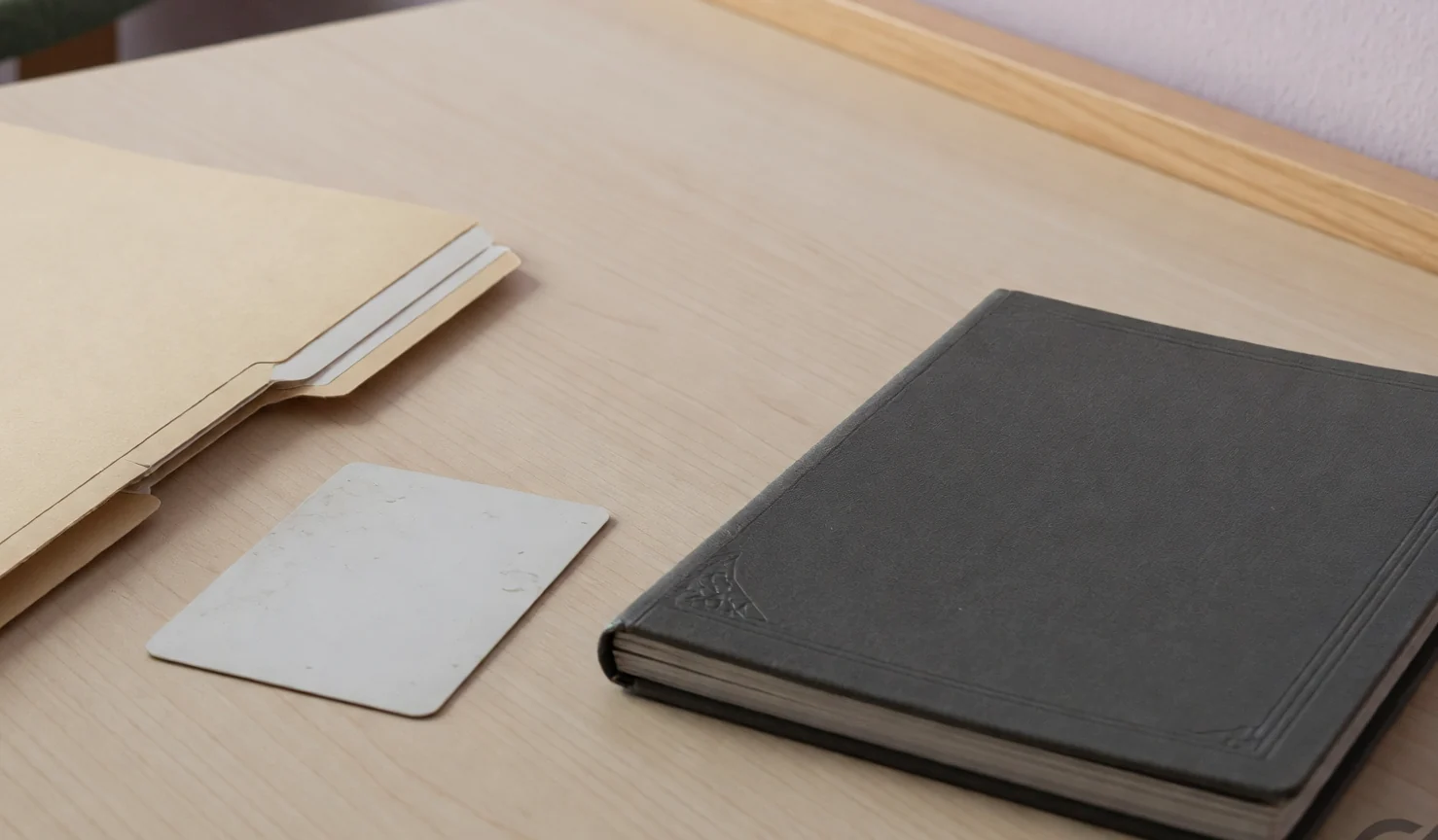 Verification desk with a blank folder and face-down card Verification desk with a blank folder and face-down card